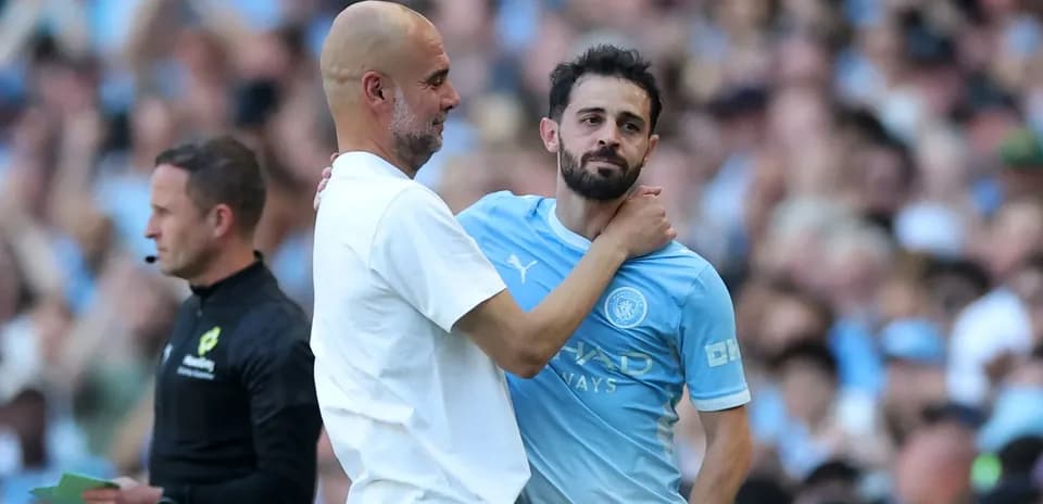 Pep Guardiola and Bernardo Silva during match substitution